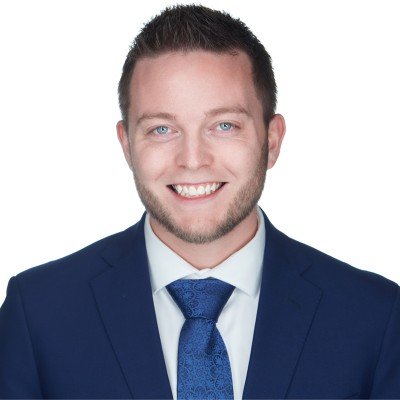 A professional headshot of Adam Storbakken, Financial Advisor / Founder of HRZN Wealth Management in Plymouth, MN