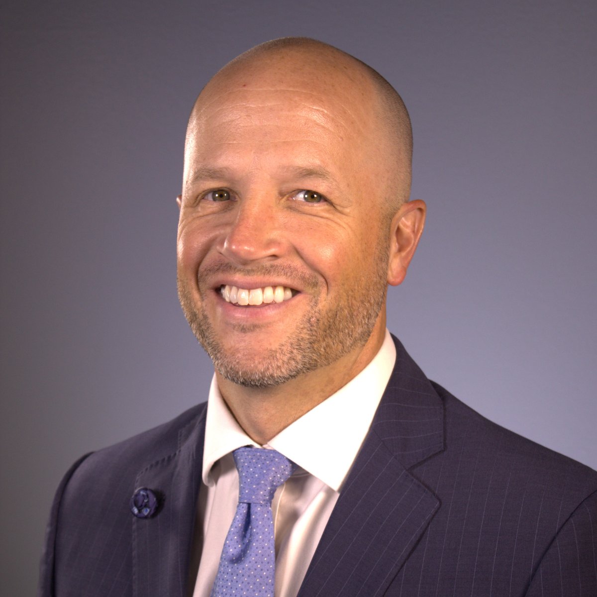 A professional headshot of Ian Moreau, Regional Director of Dimensional Fund Advisors in Austin Texas, TX